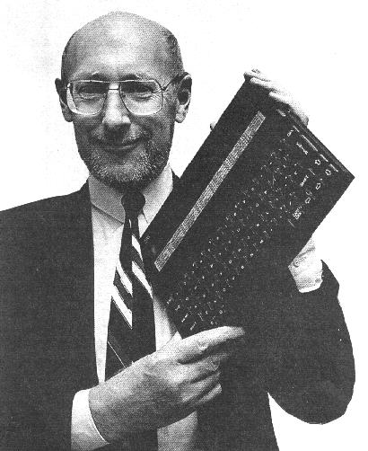 Picture of Sir Clive Sinclair holding a Z88